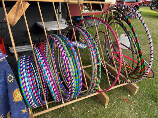 a row of brightly coloured hula hoops